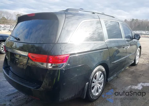 2014 Honda Odyssey Ex-L z USA, uszkodzony, nr VIN 5FNRL5H68EB121159